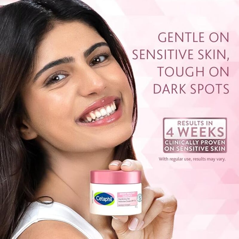 Woman holding a jar of skin care product with promotional text on a pink background.