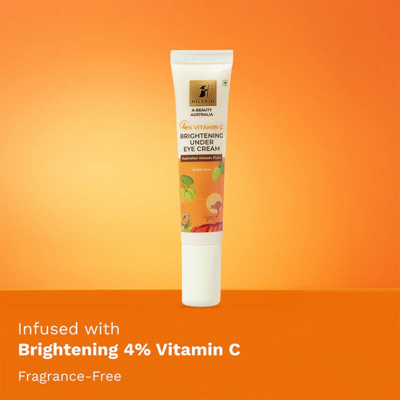 A tube of PILGRIM 4% VITAMIN C BRIGHTENING UNDER EYE CREAM with product information and branding visible on orange background