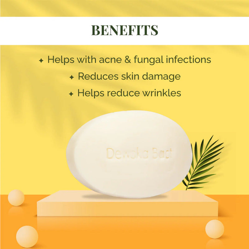 White soap bar on a beige platform with a yellow background and text listing benefits.