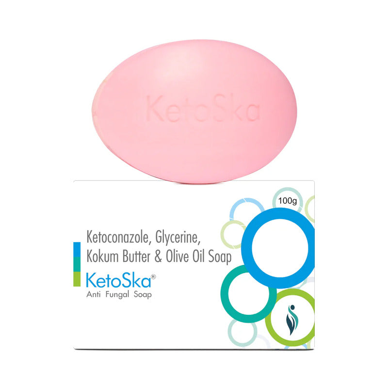 Pink soap bar with packaging on a white background