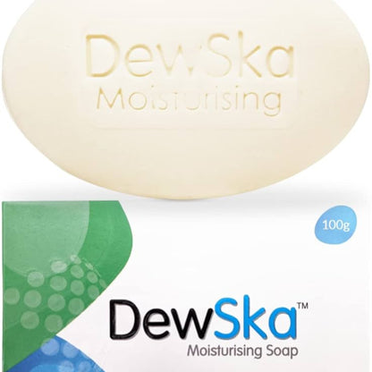A bar of DewSka moisturizing soap with packaging indicating 100g weight, predominantly white with green accents and text.