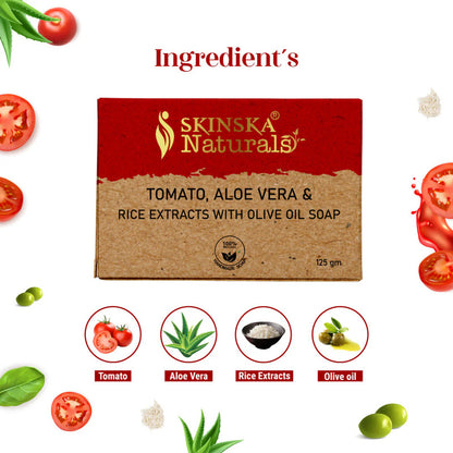 Soap bar with tomato, aloe vera, rice extracts, and olive oil ingredients on a white background.