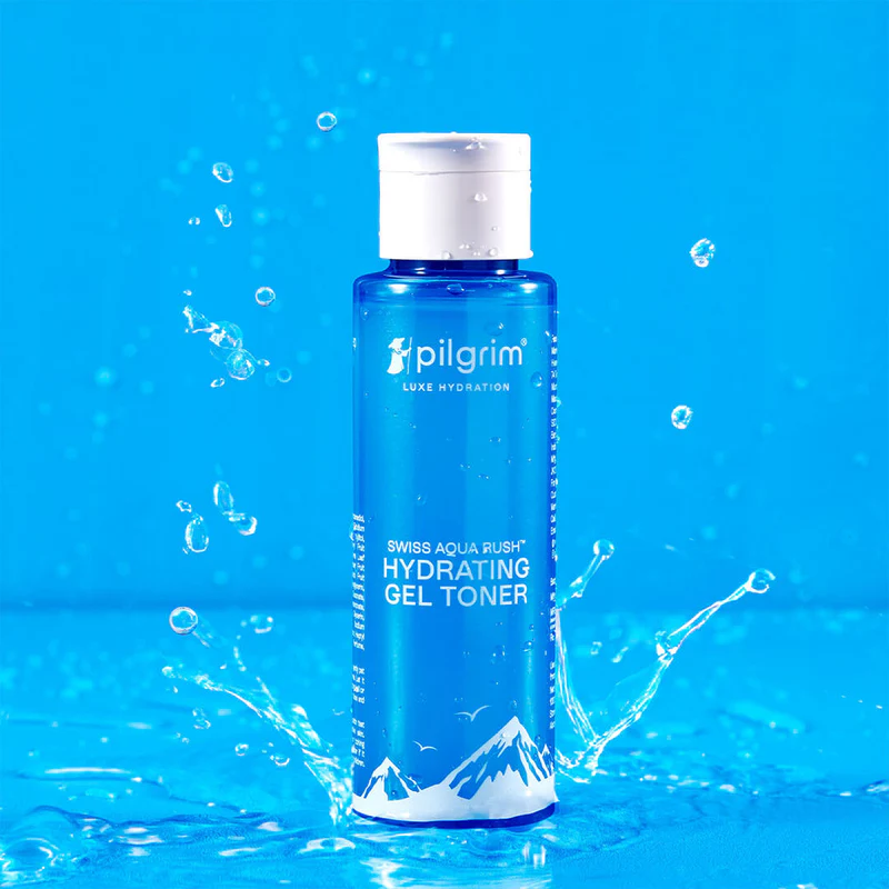 A blue bottle of PILGRIM Swiss Aqua Rush Hydrating Gel Toner with white and silver text, and graphics of mountains on blue background